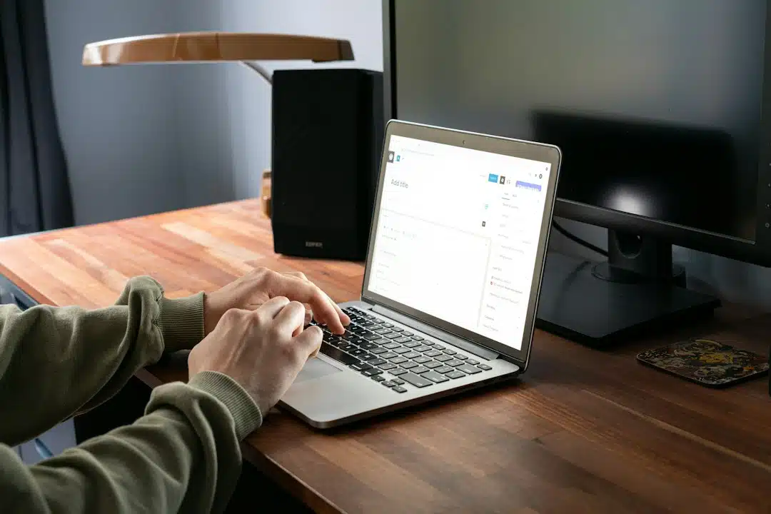 Person building a new website on a laptop